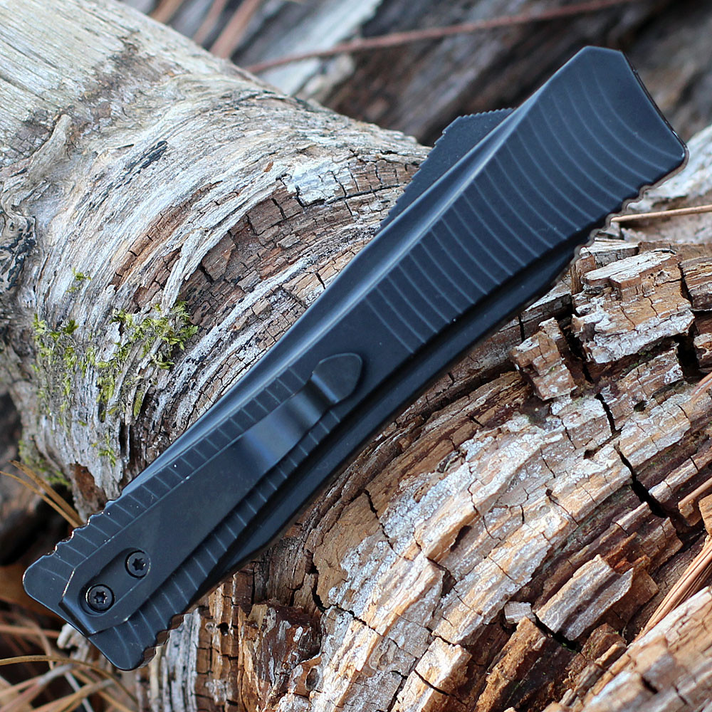 Boker Plus Falcon 2.0 OTF 06EX245 titanium-coated black aluminum handle — ergonomic texture, double-action thumb slide, deep-carry clip