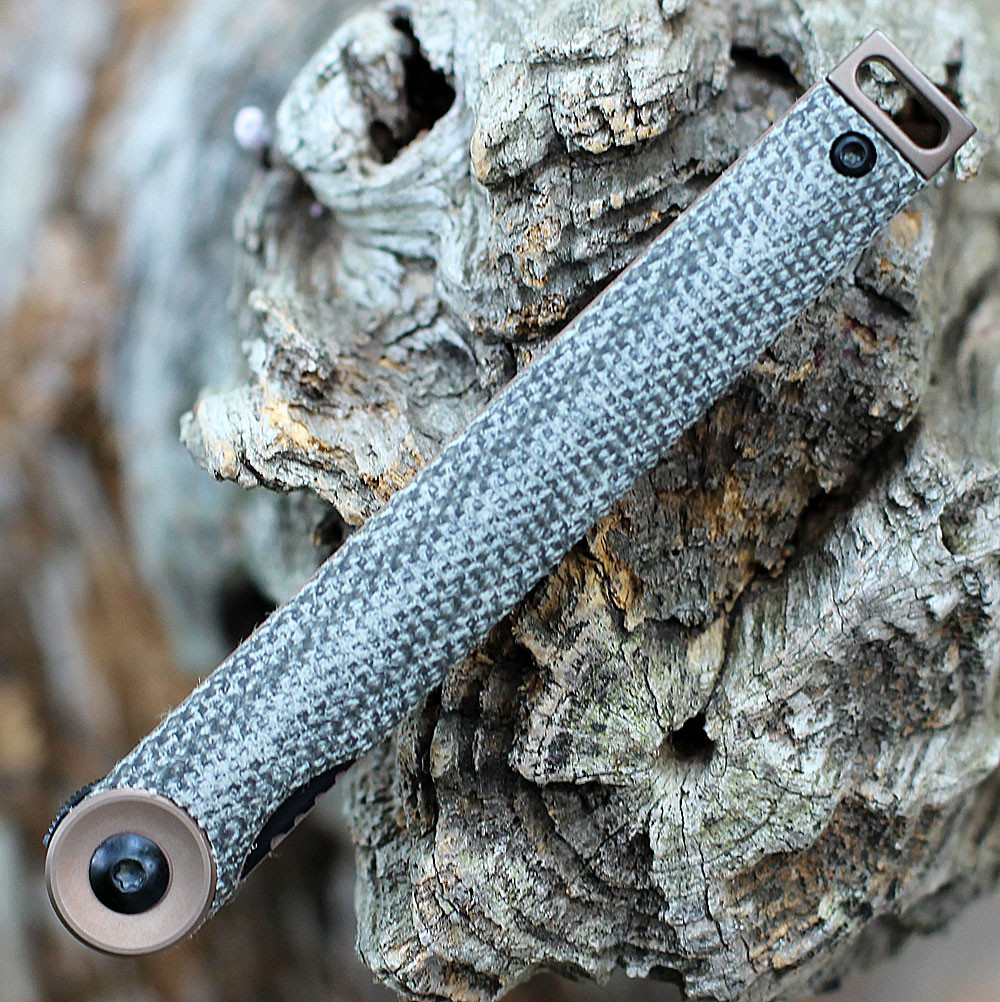 Boker Plus Kaizen 01BO391 olive green canvas Micarta handle — bronze pivot ring, bronze lanyard hole, black hardware, Liner Lock