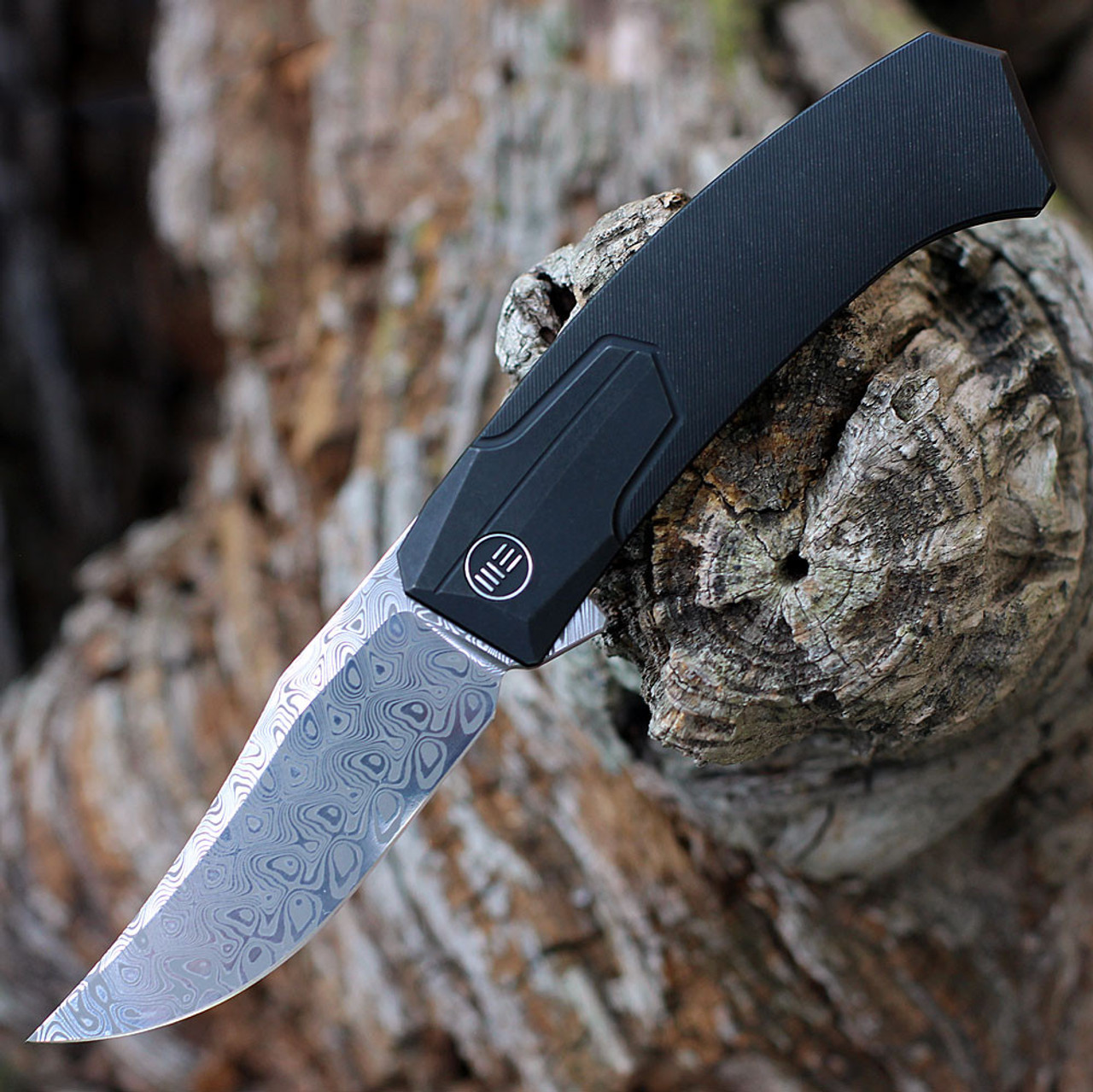 WE Knife Shudden Flipper( WE21015DS1) - 3.48" Hakkapella Damasteel Damscus Trailing Point Plain Blade, Black Titanium Handle