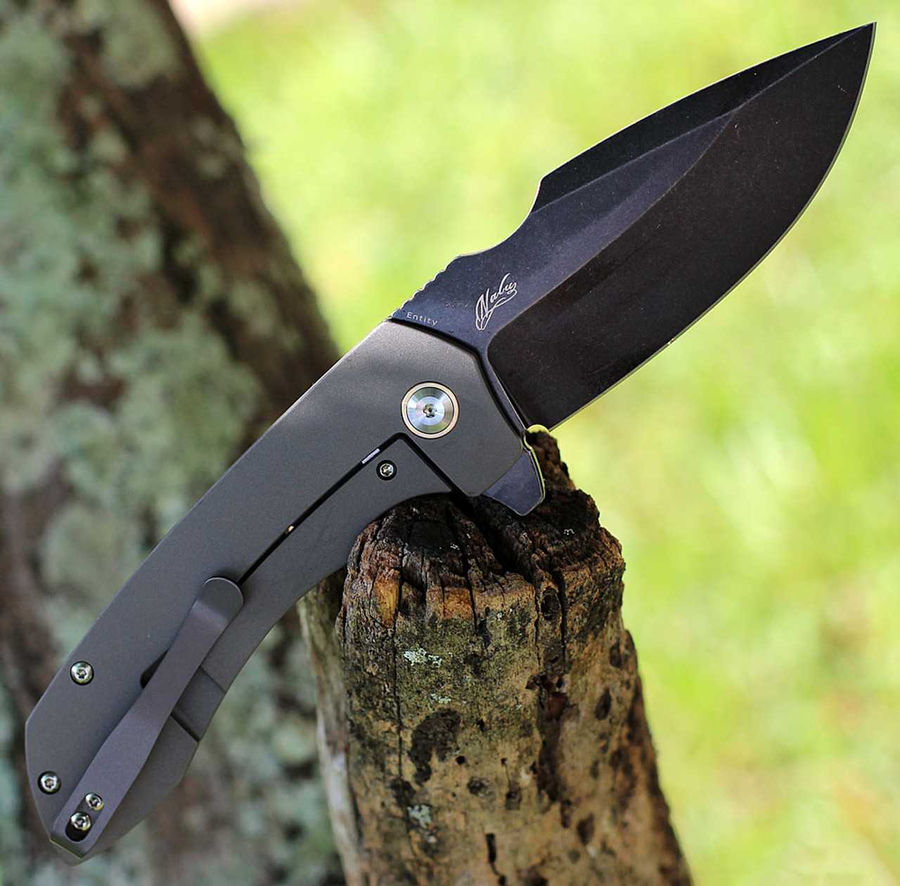 Kansept Entity Flipper ( K1036A2) - 3.52" CPM S35VN Black Stonewash Drop Point Blade, Machine Holed Silicon Carbide Titanium Handle