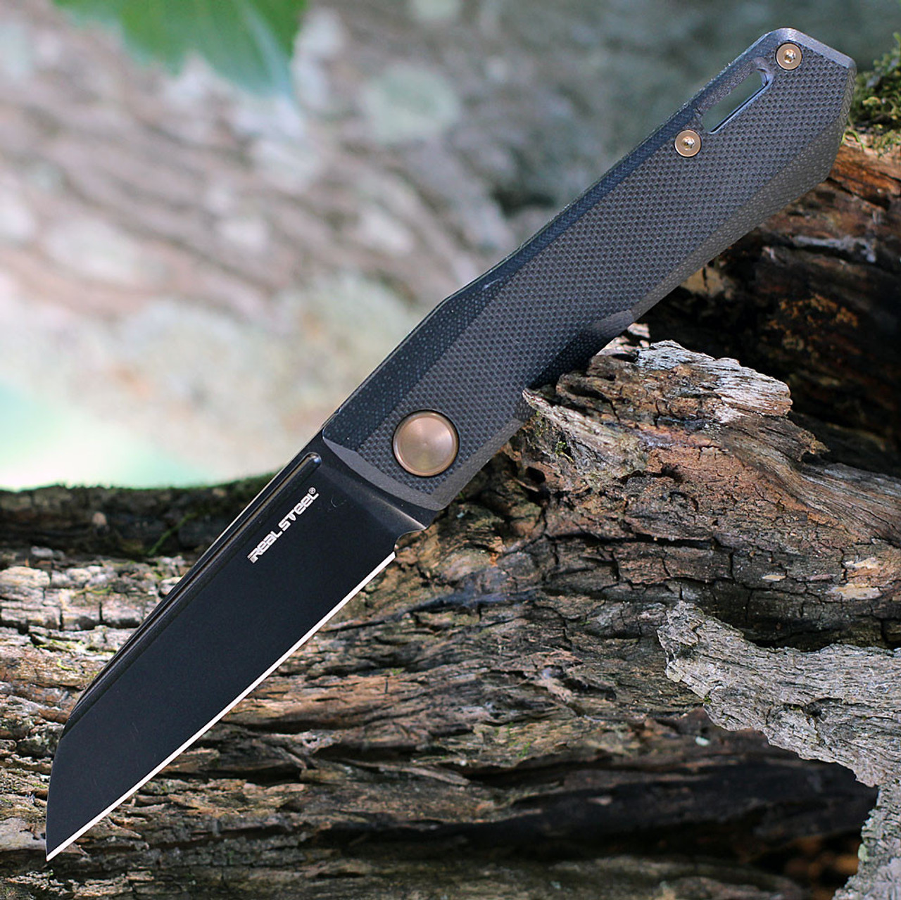 Real Steal Solis Lite Slip Joint (RS7064FZ) 2.91" Black Coated D2 Sheepsfoot Plain Blade, Black G-10 Handle with Bronze Accents.