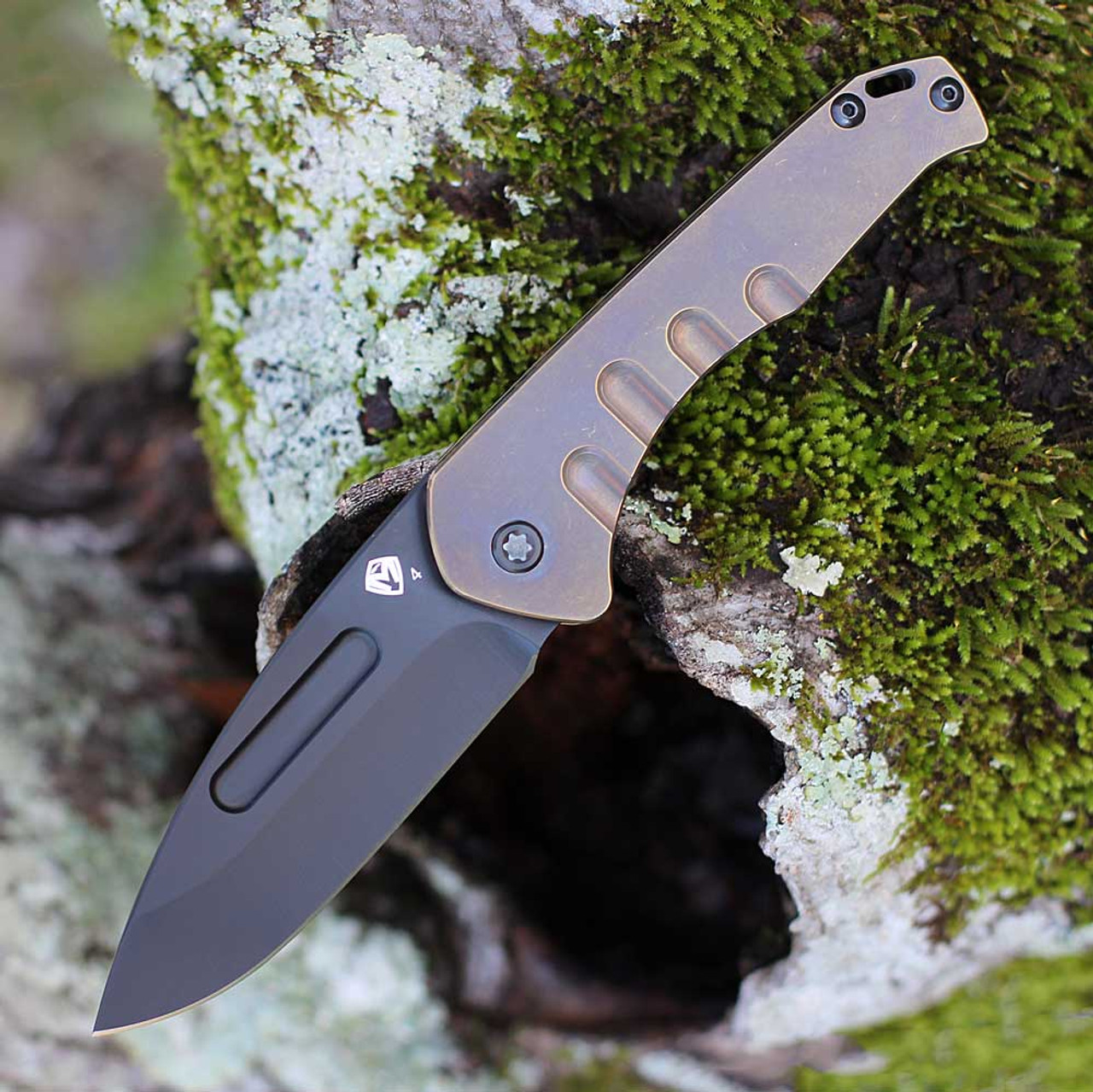 Medford Knife & Tool Praetorian Slim Flipper Frame Lock (MD208SPD36A1)- 3.25" Black PVD CPM-S35VN Drop Point Blade, Bronze Tumbled Titanium Handle