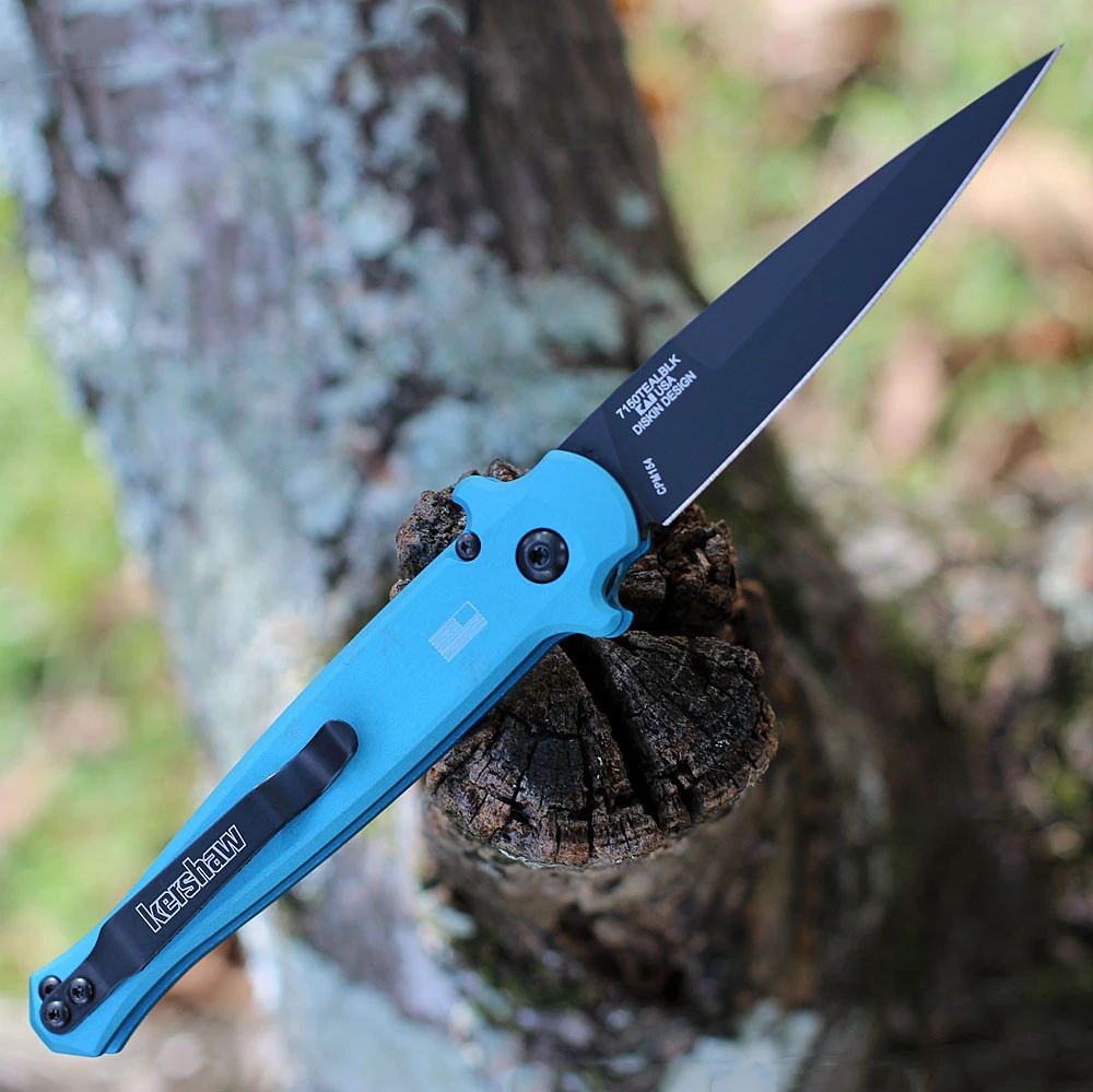 Kershaw Launch 8 being deployed via push button showing the symmetrical design and integrated finger guards.