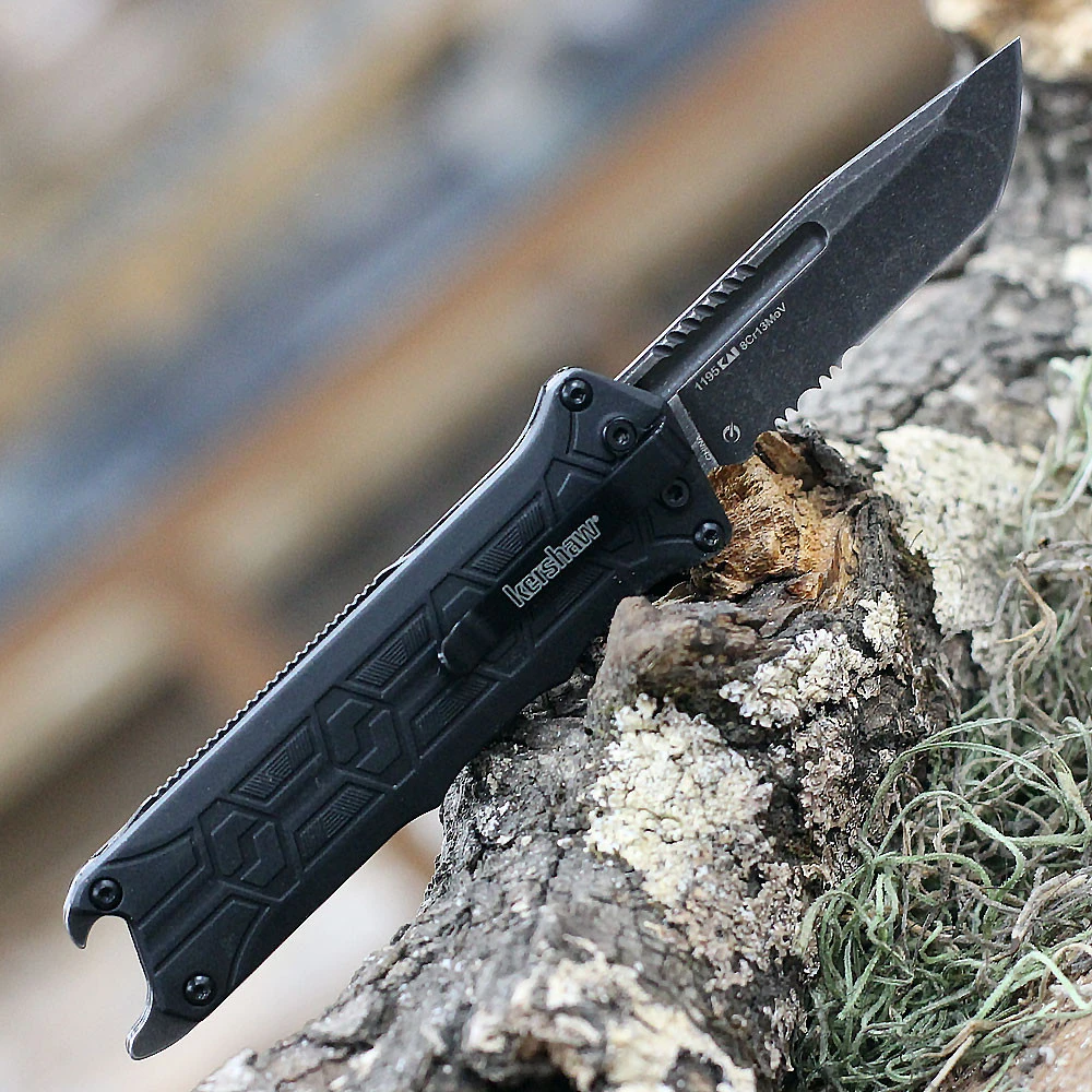 Kershaw Interstellar blade partially deployed via the manual slide mechanism.