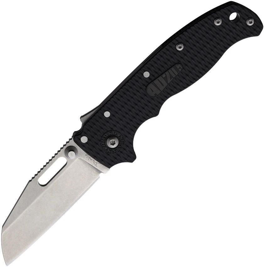 The Demko AD20.5 Shark Lock open, showing its 3.25-inch flat-ground, stonewashed AUS-10A Shark Foot blade with a straight plain edge, black textured Grivory scales over steel liners, the spine-mounted Shark-Lock fin, a thumb stud and thumb hole, and a tip-up pocket clip.