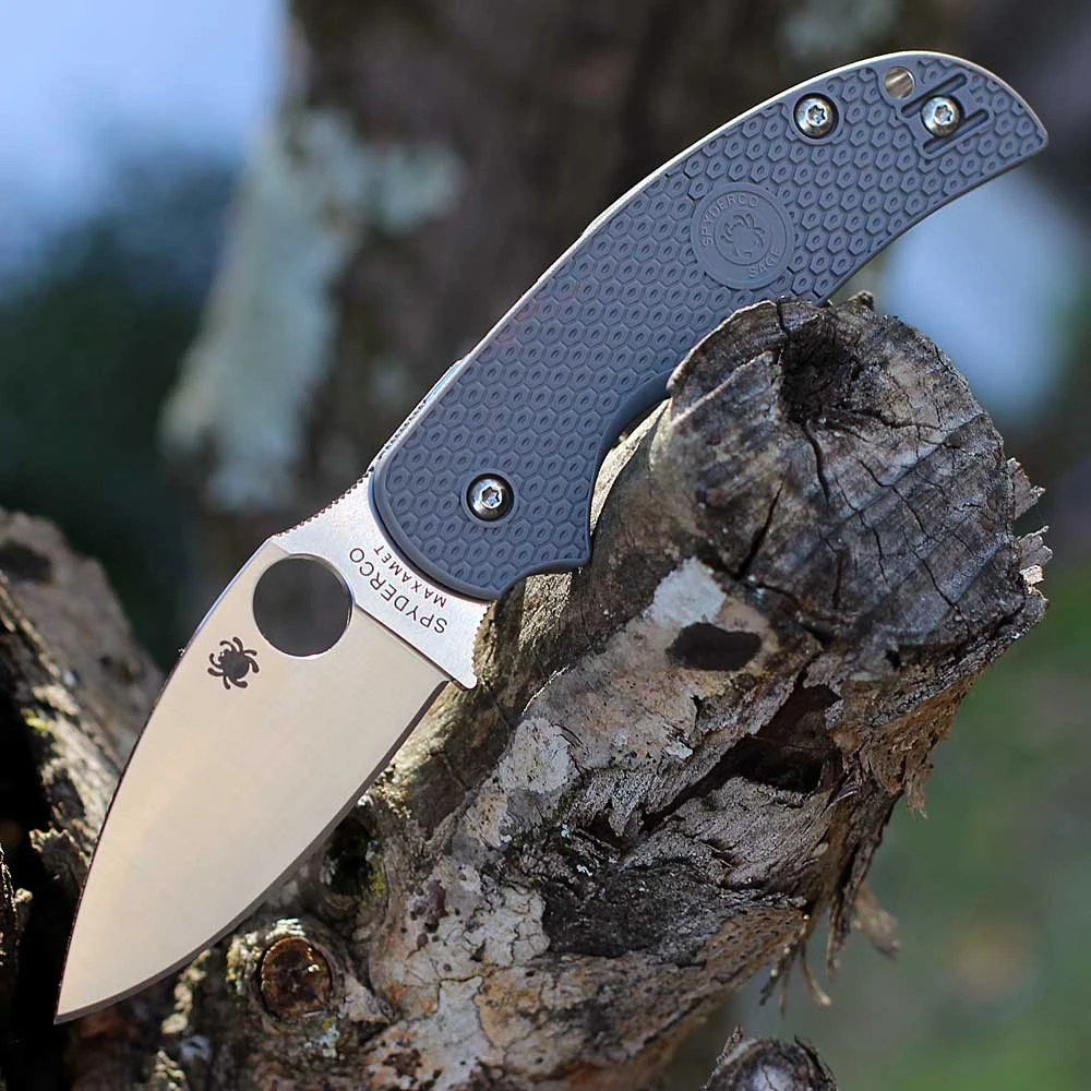 The Spyderco Sage 5 Lightweight C123PGY is shown open in profile against a white background. The satin-finished leaf-shaped blade with a Trademark Round Hole extends from a gray textured FRN handle.