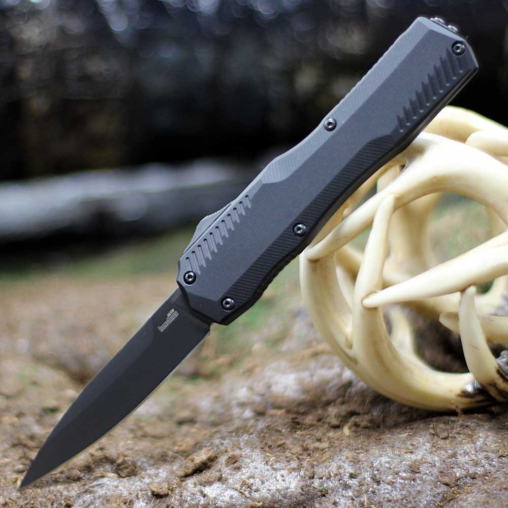 Kershaw Livewire 9000BLK OTF automatic knife open view showing the black PVD MagnaCut blade and all-black handle.