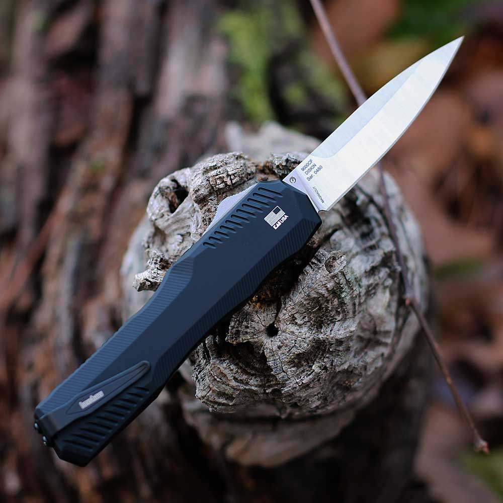 Rear view of the 9000CF showing the black anodized aluminum back handle and reversible deep-carry pocket clip.