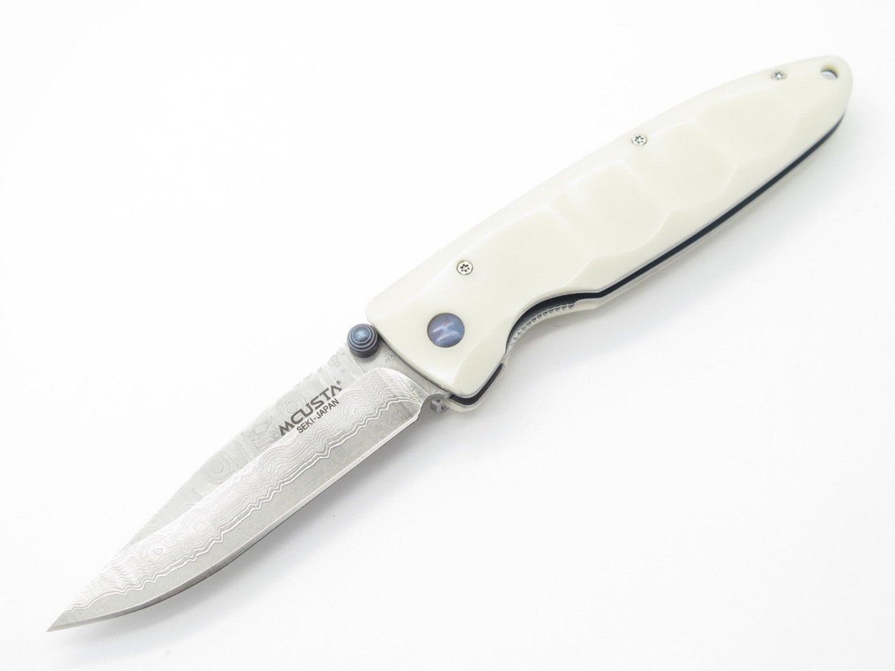 Mcusta Basic Folding Knife (MC-0015D) 3.25" VG-10 Damascus Spear Point Satin Blade, White Corian Handle