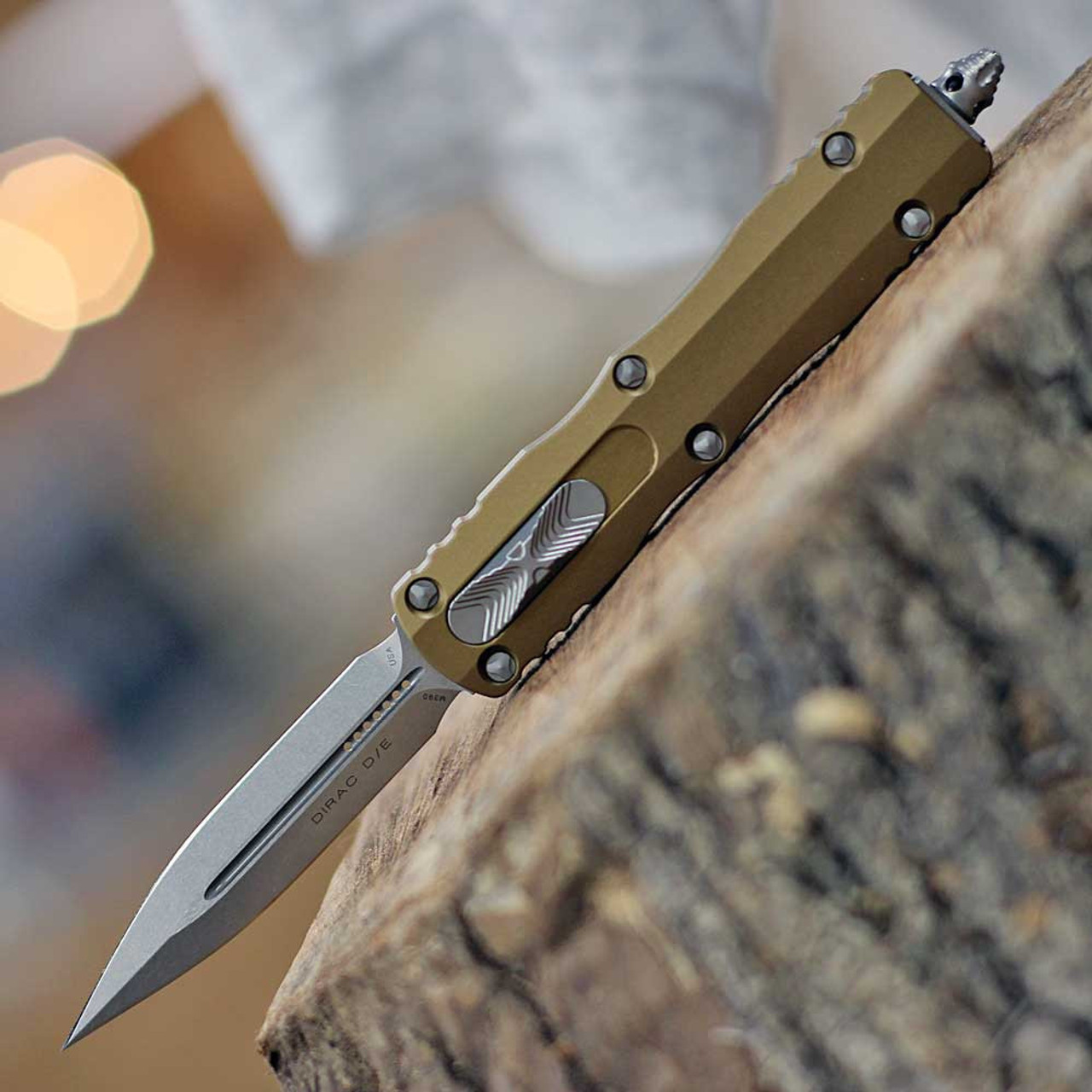 Microtech Dirac D/E OTF (MCT22510TA) 2.92" Stonewashed Double Edged Dagger Plain Blade, Tan Aluminum Handle