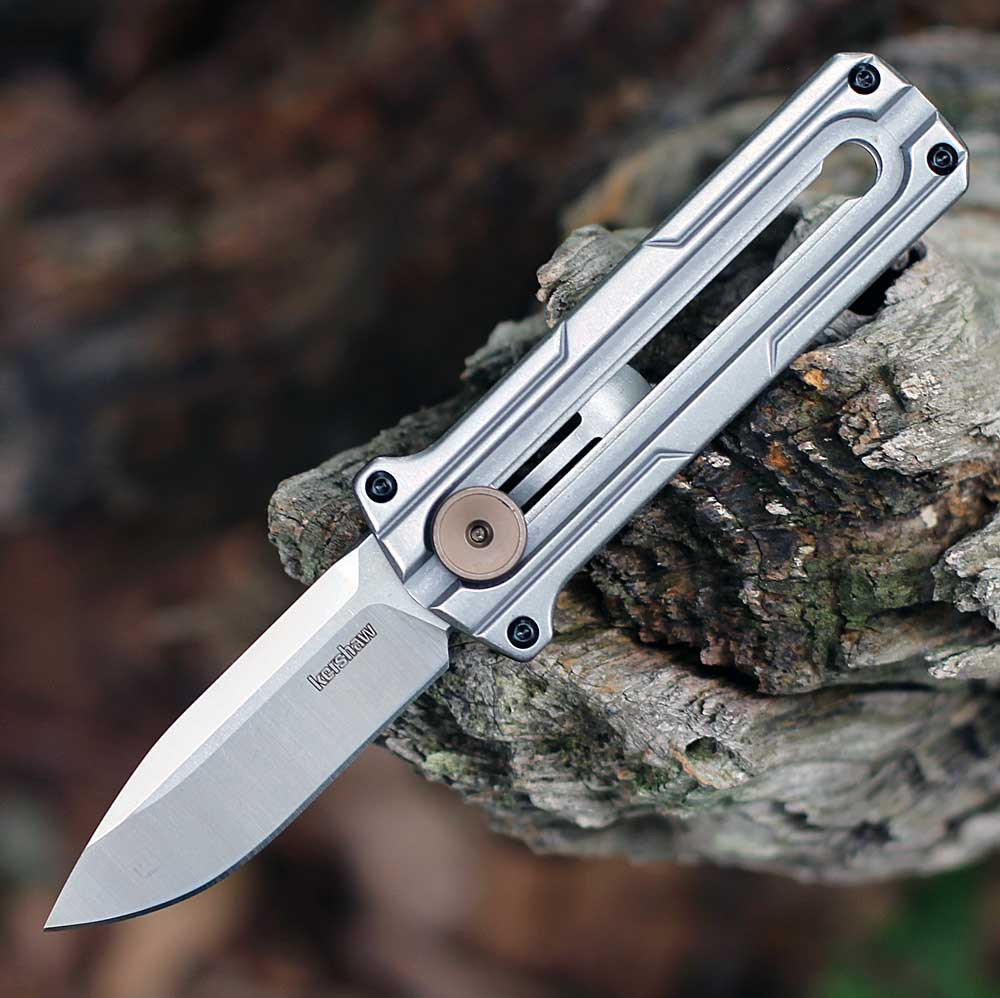 Kershaw Cybernet 2046 manual OTF knife showing the 2.4-inch two-tone D2 blade and stonewashed steel handle.