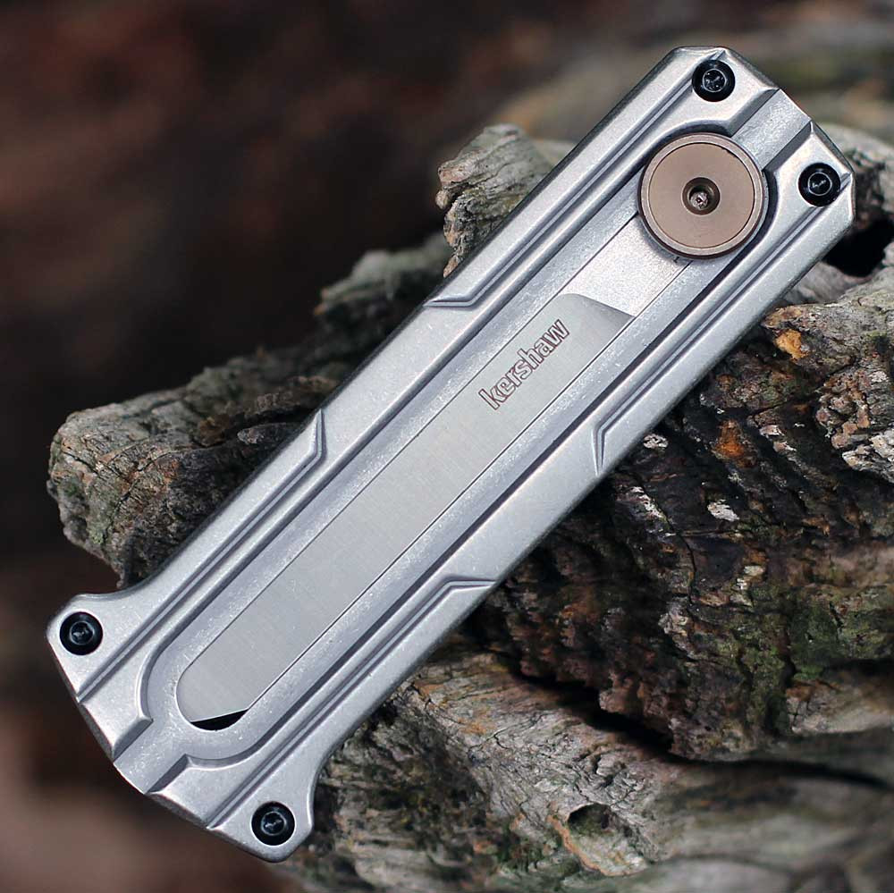 Close-up of the stonewashed stainless steel handle and the bronze PVD sliding button on the Kershaw 2046.