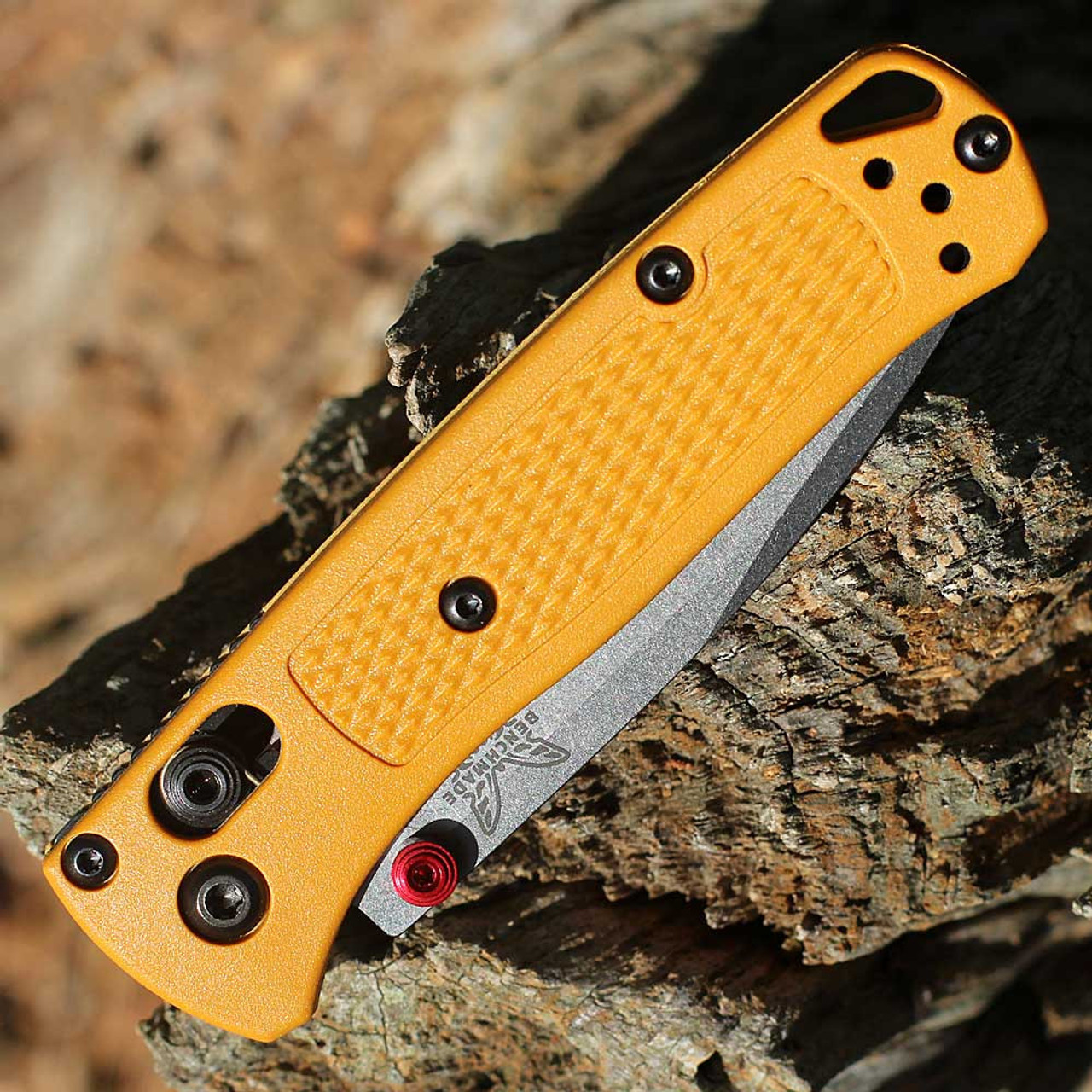 Daybreak Yellow Grivory handle scales with Bordeaux anodized spacers