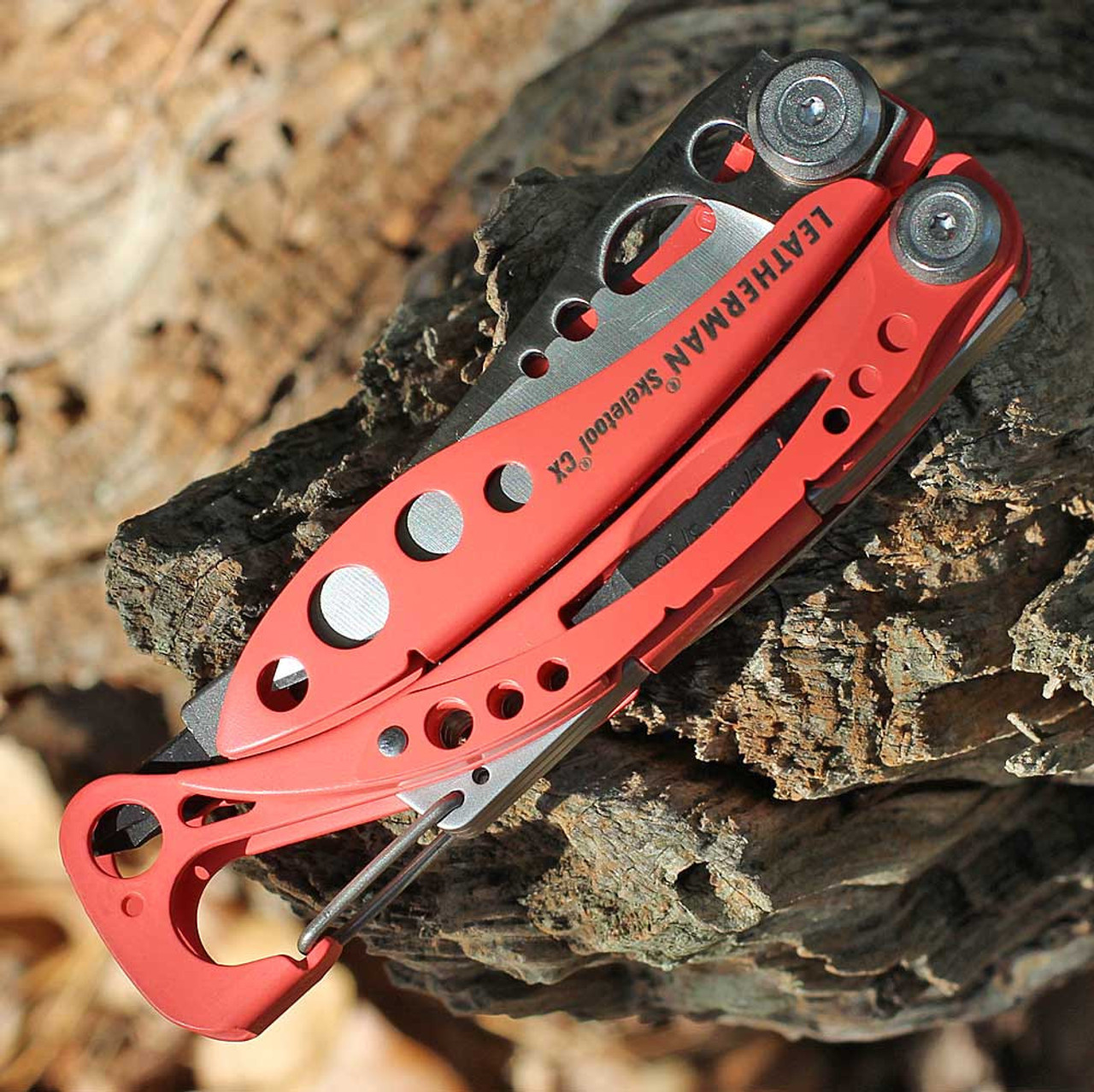 Leatherman Skeletool CX (833143) 2.6" 154CM Satin Wharncliffe Plain Blade, Guava Aluminum Handle (7 Tools)