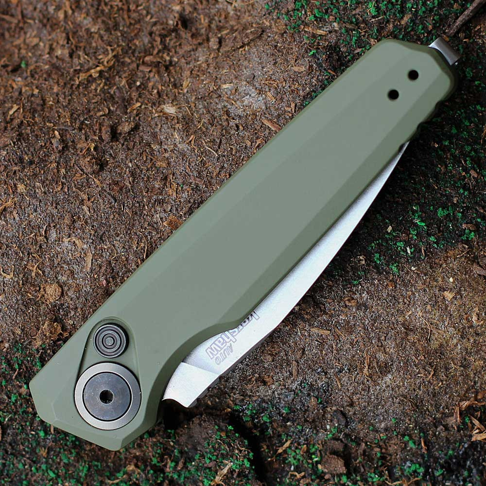 Kershaw Launch 18 7551OL automatic knife open view showing the 2.79-inch stonewashed spear point blade and green handle.