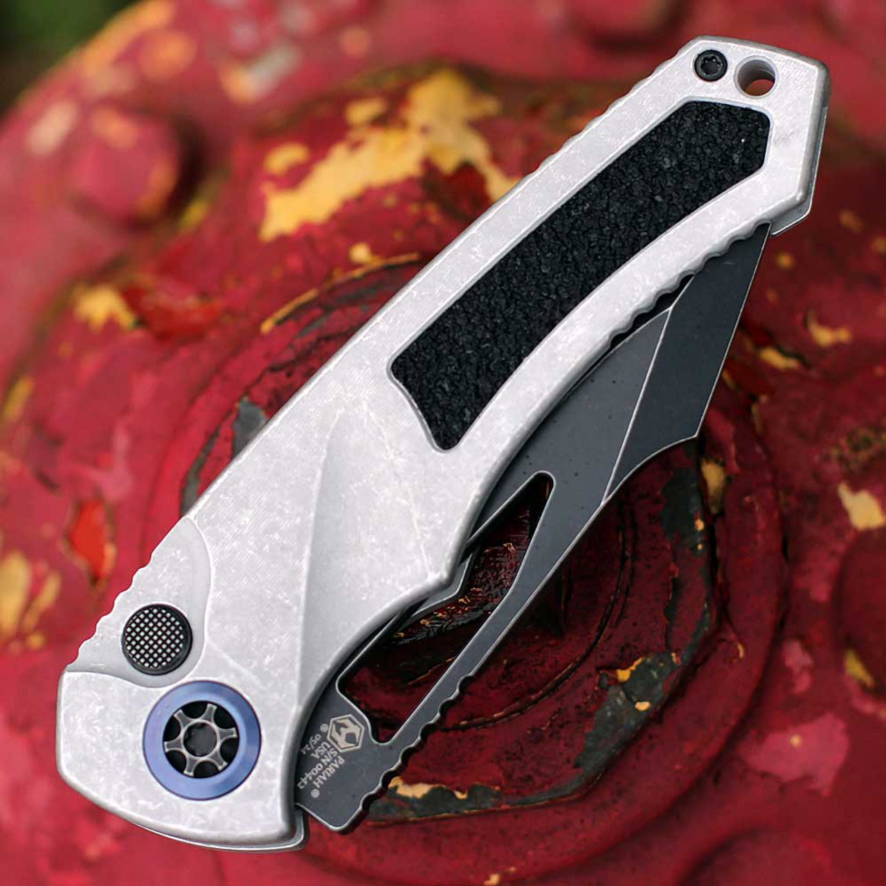 Heretic Knives Pariah Manual (H046-8A-BLZ) 3.75" MagnaCut Drop Point Battle Black Plain Blade, Blizzard Aluminum with Black Traction Inserts, Blue Titanium Pivot Collars, Battleworn Hardware, Machined Ball Clip