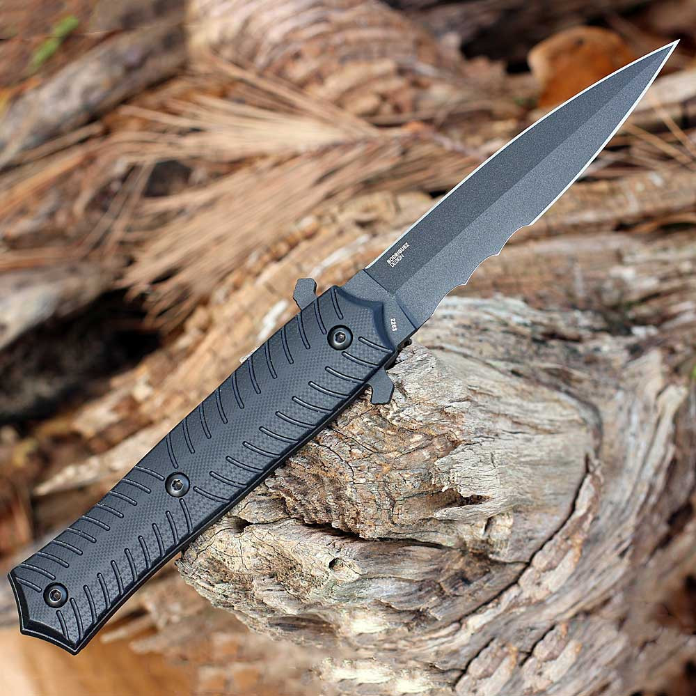 CRKT Xolotl 2263 profile view showing 4.53 inch SK-5 black powder coated spear point blade with Veff Serrations and black G-10 handle.