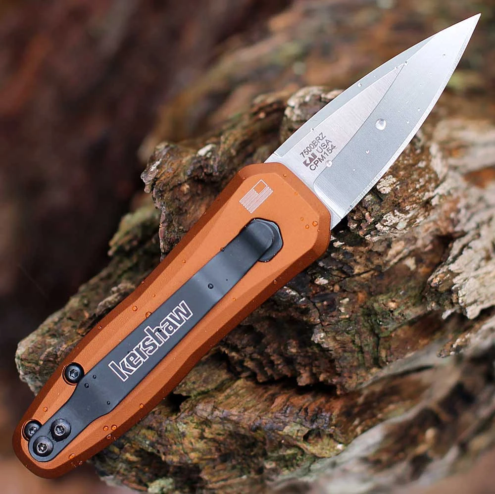 Detailed close-up of the satin finish on the CPM-154 spear point blade of the Kershaw Launch 4.