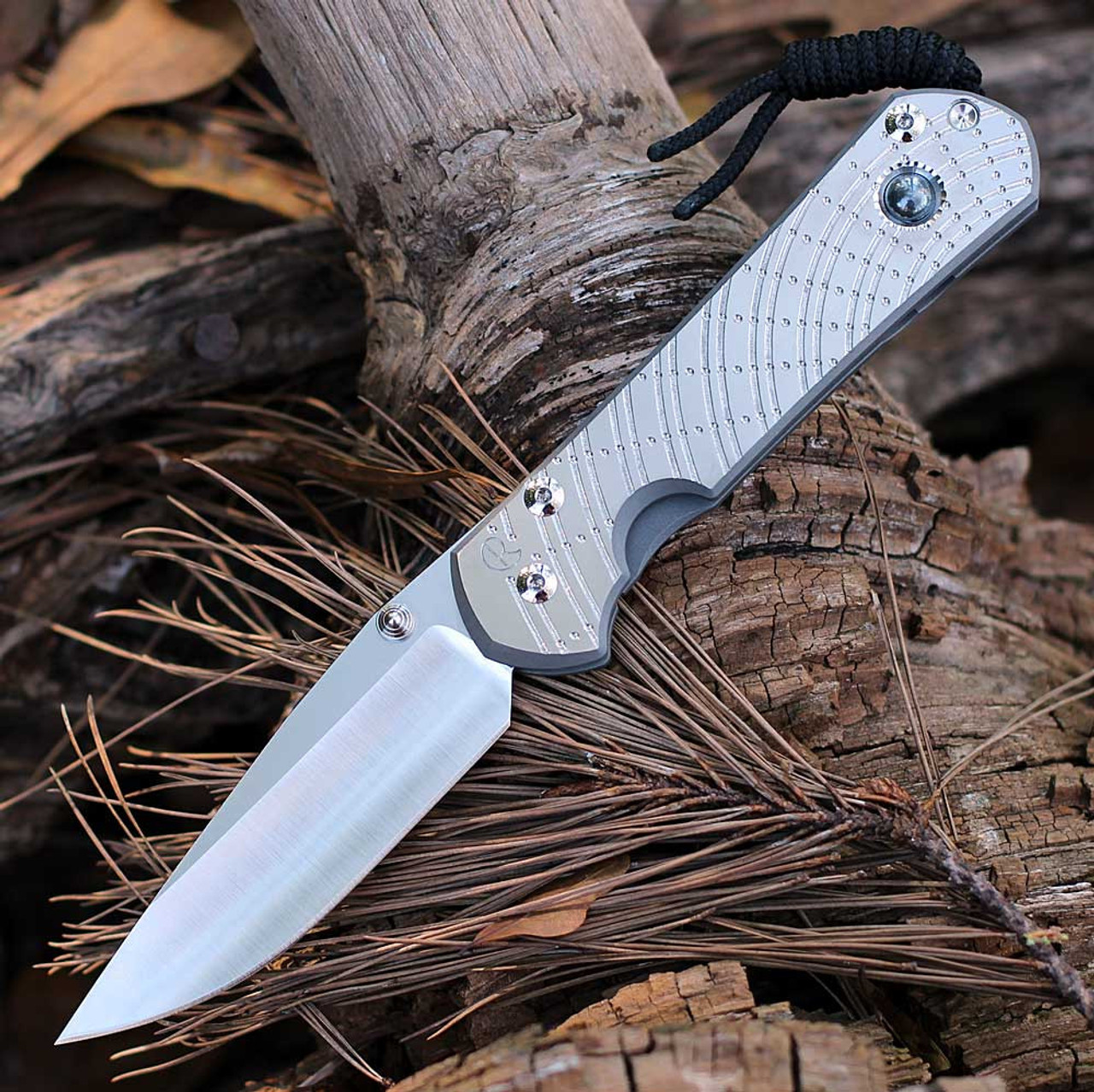 Chris Reeve Large Sebenza 31 Unique Graphic Style: SS20"A" - 3.61" Stonewash/Polished CPM-MagnaCut Drop Point Blade, Sandblasted Titanium with Hematite (L31-1408-0400)
