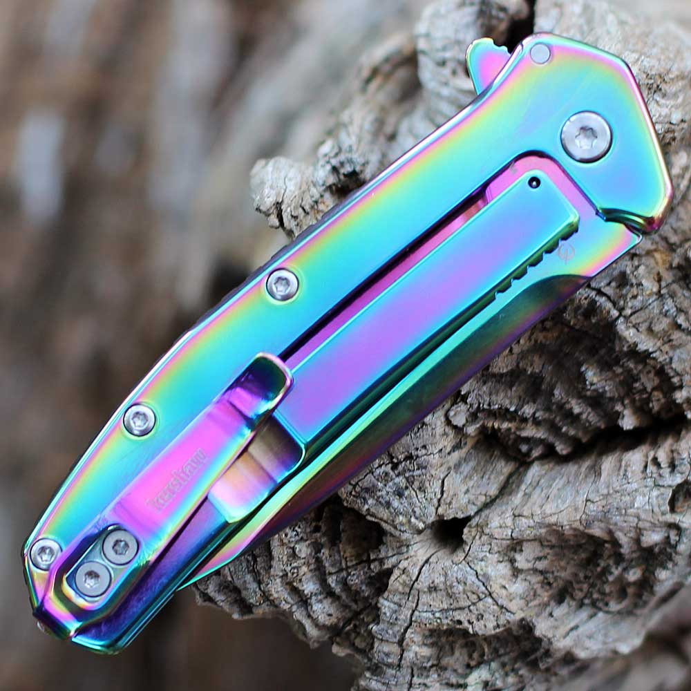 Detailed close-up of the steel frame lock and jimping on the rainbow-finished Kershaw Outcome.