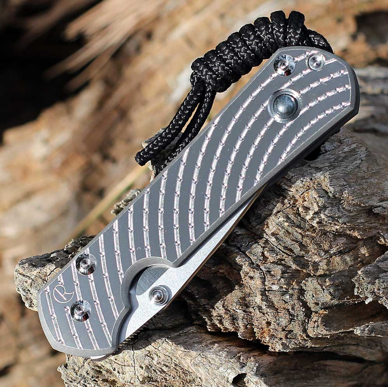 Chris Reeve Small Sebenza 31 Unique Graphic Style: SS20"A" - 2.99" Stonewash/Polished CPM-MagnaCut Drop Point Blade, Sandblasted Titanium with Hematite, Silver Hardware (S31-1408-0400)