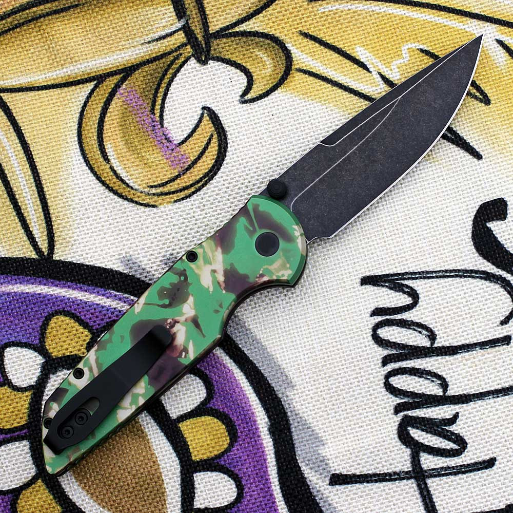 Blackwash CPM S35VN drop point blade with thumb studs