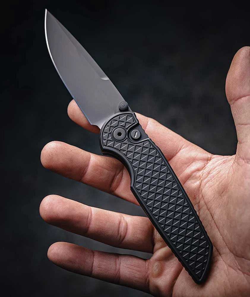 Pro-Tech Mordax - OPERATOR GRIDLOCK Textured Black Aluminum Scale, Tritium Push Button Lock (MX106-OPERATOR) 3.57" Sterile DLC Magnacut Drop Point Blade