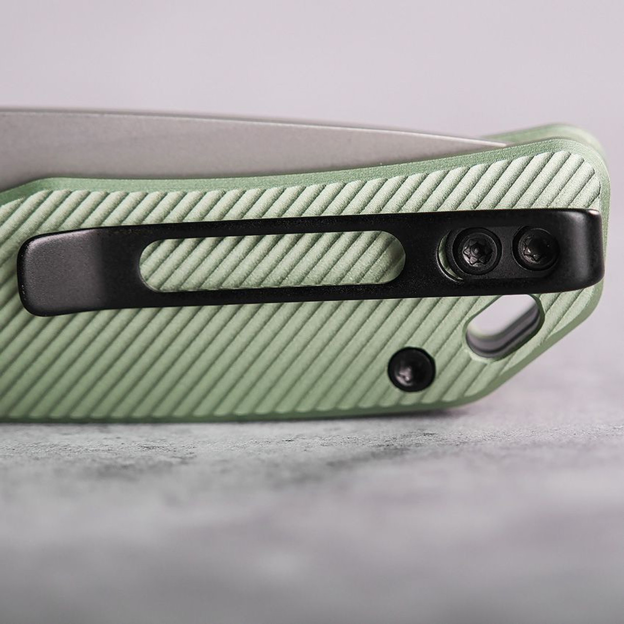 Vosteed Marten- Thumb Stud Knife 2.98" 154CM Stonewashed Drop Point Blade, Green Aluminum Handles, Hard Case, Button/Top Liner Lock, Reversible Black Stainless Steel Pocket Clip - A1602