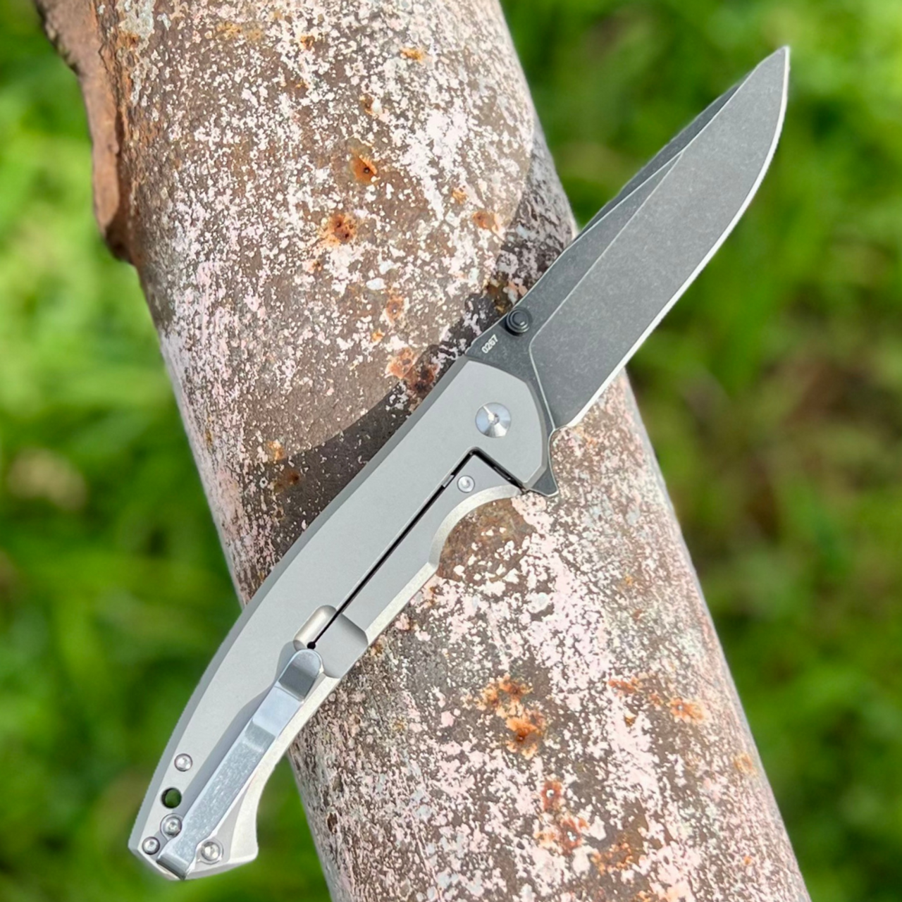 Cobratec Aventus (CTAVN) 4" S35VN Blackwash Drop Point Blade, Carbon Fiber Front Handle, Gray Titanium Back Handle, Frame Lock