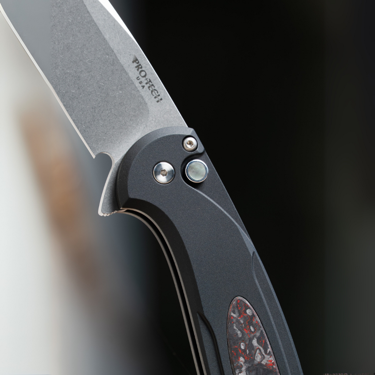 Pro-Tech Cambria 2 (CF2101-LTD TC Red) 3.5" Stonewash Magnacut Drop Point Plain Blade, Black Aluminum with TechnoCarbo Red Inlays, Black Lip Pearl Button, Satin Hardware, Polished Clip