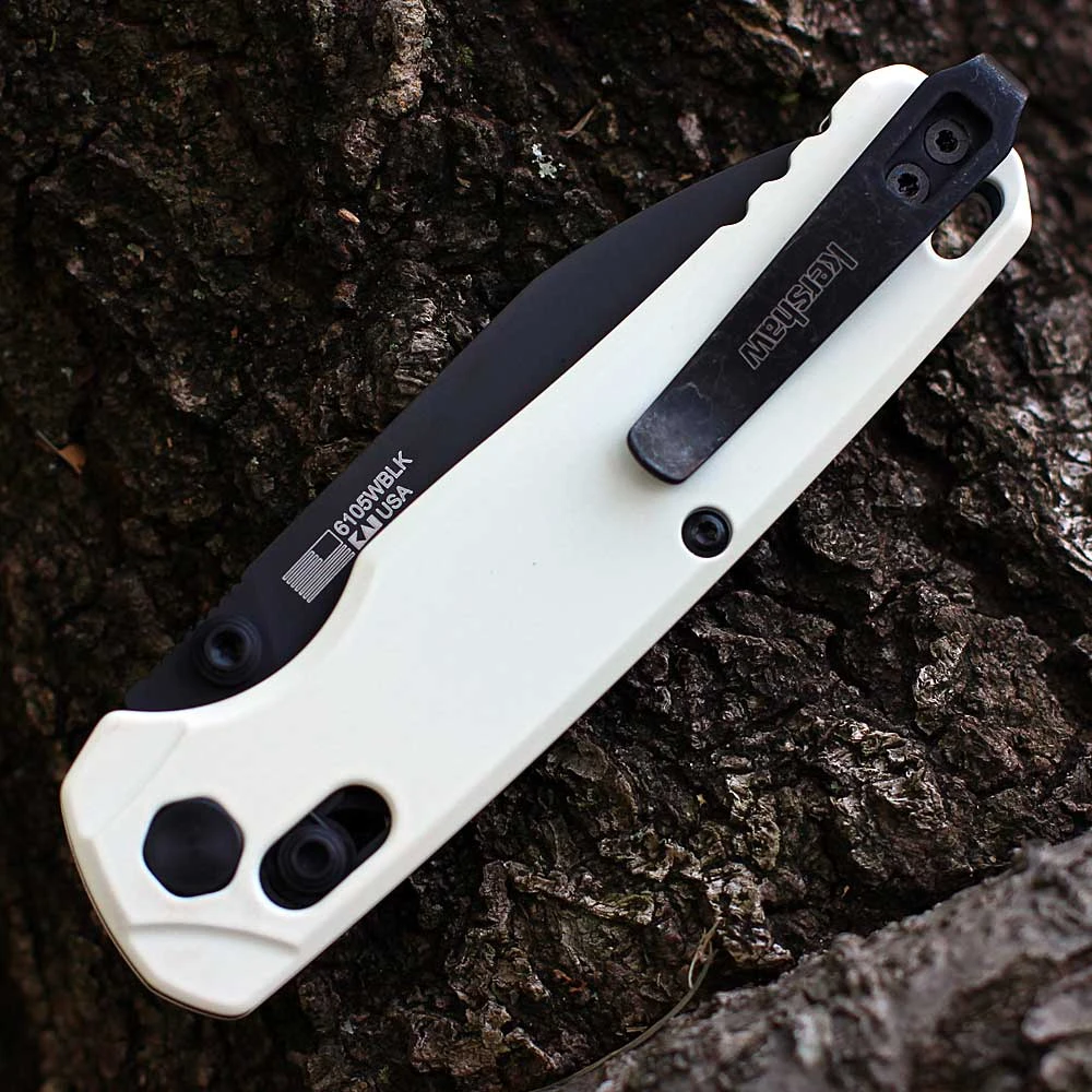 Detailed close-up of the black DuraLock crossbar mechanism and black thumb studs on the white aluminum handle.