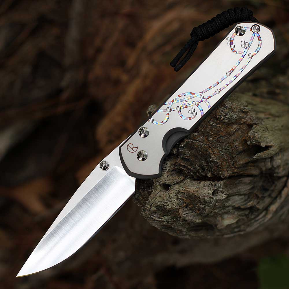 Chris Reeve Large Sebenza 31 Unique Graphic L31-1400-0004.6 profile view showing satin MagnaCut blade.