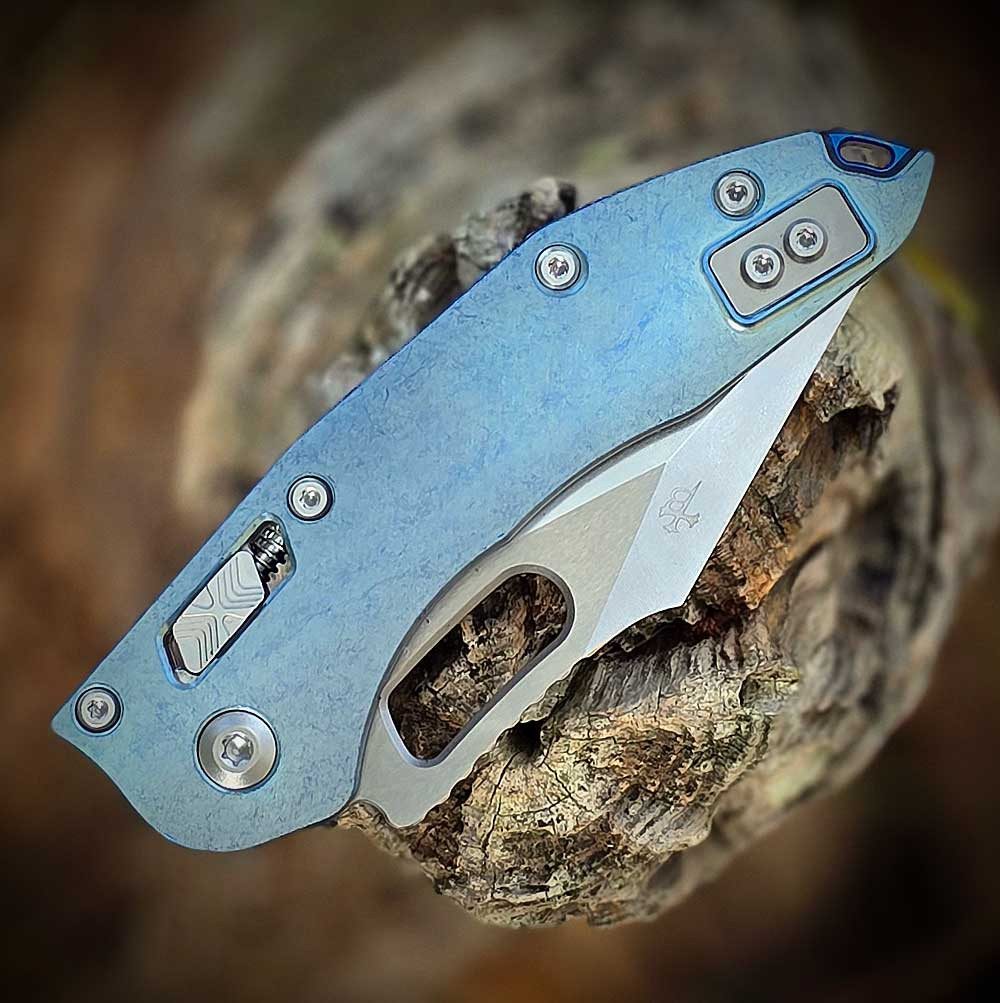 Microtech Stitch RAM-LOK 169RL-10MS6 Ice Blue Anodized Slab Titanium Handle Bronze Accent Hardware Detail