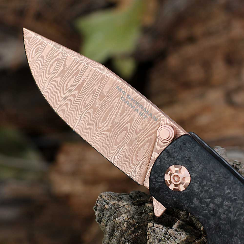 Chad Nichols Rose Gold Damascus blade tank steel close up