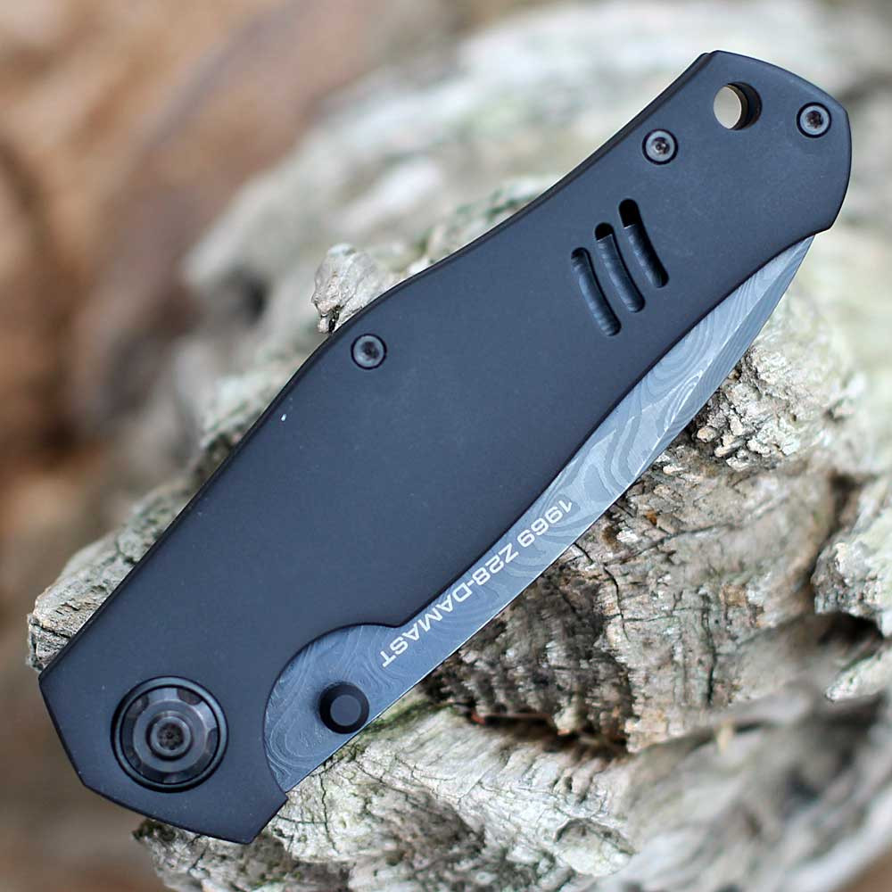 Sculpted black aluminum handle of the Boker Camaro Z28 inspired knife.