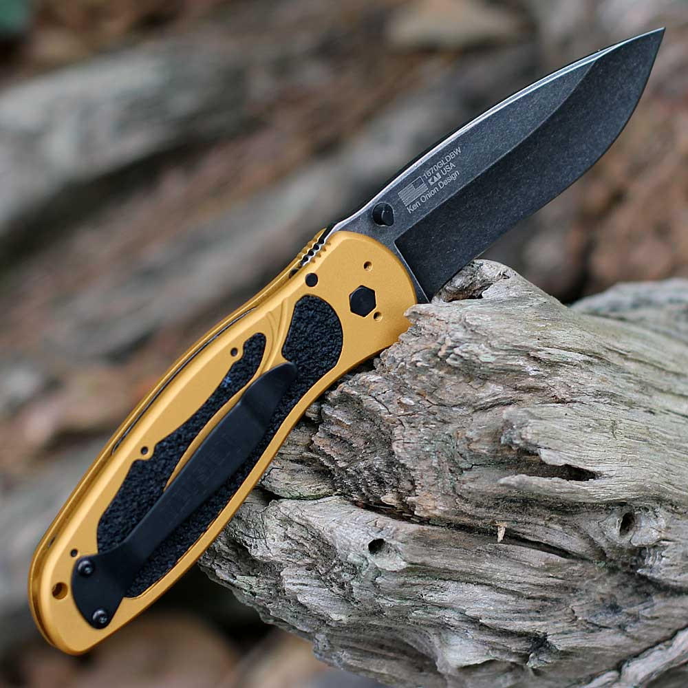 The Kershaw Blur Gold BlackWash being deployed highlighting the snappy SpeedSafe action and 7.9-inch overall length.