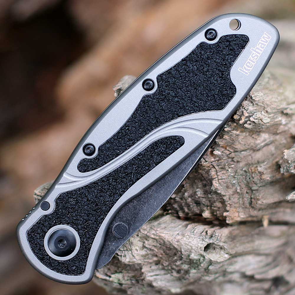 Detailed close-up of the Gray anodized aluminum handle and the black Trac-Tec traction inserts on the 1670BGBW.