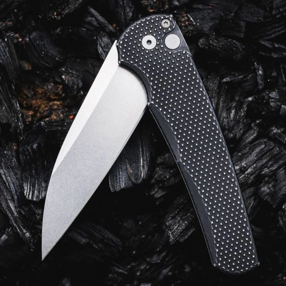 Pro-Tech Malibu 5305-BW battleworn in hand, 7.5 inch overall, 3.0 oz, made in USA manual flipper