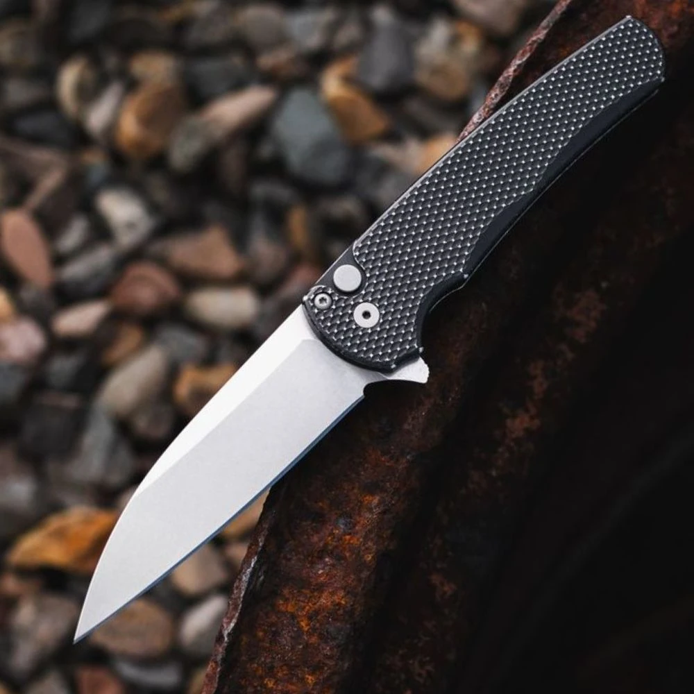 Pro-Tech Malibu 5305-BW battleworn in hand, 7.5 inch overall, 3.0 oz, made in USA manual flipper