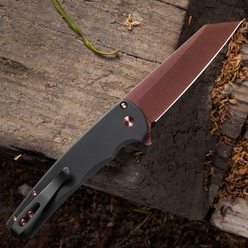 Pro-Tech Malibu BSA26.Malibu.1 shown from the spine side on a dark wood background. The black aluminum handle, copper rose PVD hardware, and tip-up pocket clip are visible in profile, showing the overall proportions of the Malibu platform from the back of the knife.