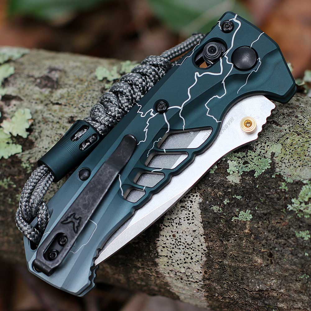 Benchmade Mini Adira 18065-ABEL1 handle close — Abel Dark Waters Lightning anodized aluminum, white lightning etching, ported scales, AXIS Lock detail