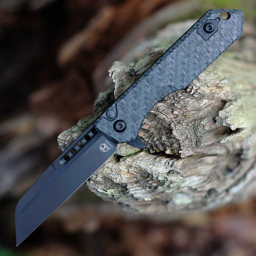 Heretic Knives Jinn Manual H213-6A-GLOCF closed — CPM MagnaCut DLC black wharncliffe, glow-in-the-dark carbon fiber handle