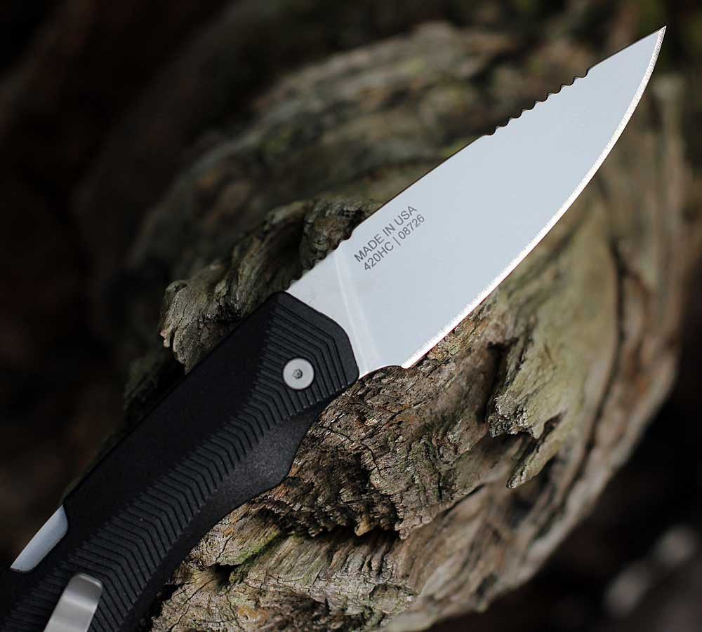Gerber Forefront Hunt 2009292 420HC stonewash drop point blade close-up — "Made in USA" stamp visible, plain edge, black nylon handle