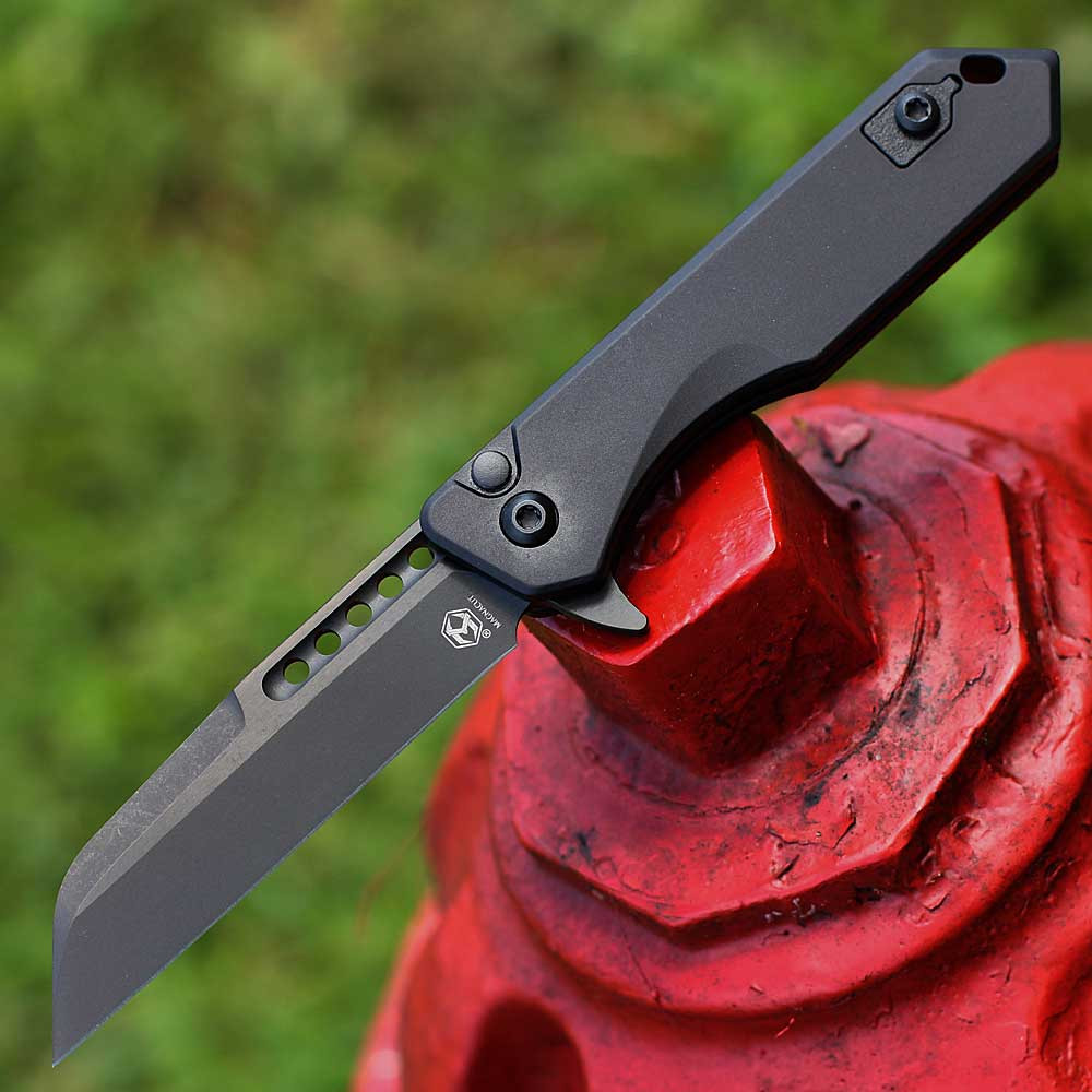 Heretic Jinn Manual H213-6A-T open — CPM MagnaCut DLC Black Battleworn Wharncliffe, black aluminum handle, Button Lock, made in USA