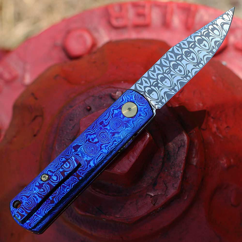 Boker Germany BRLW Fulldress 110675DAM Damasteel Nidhogg Damascus — 264 layers, 59 HRC, 2.58 in drop point, false edge, uncoated