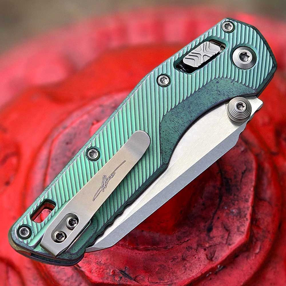 Microtech MSI Mini Ram-Lok Marfione Select closed, back view showing bronze titanium hardware and Ram-Lok lock bar