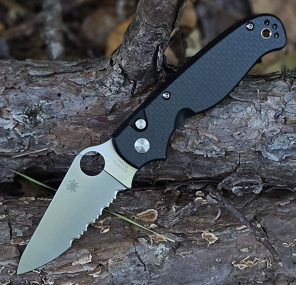 Spyderco ButtonUp C275CFPS open — 8Cr13MoV satin modified clip point, carbon fiber G-10 laminate handle, Button Lock, reversible hourglass clip