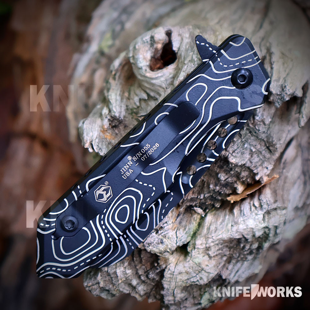 Heretic Jinn Manual H213-TOPO DLC topo pattern — deep-engraved topo on blade and aluminum handle, unified design, Heretic Knives USA