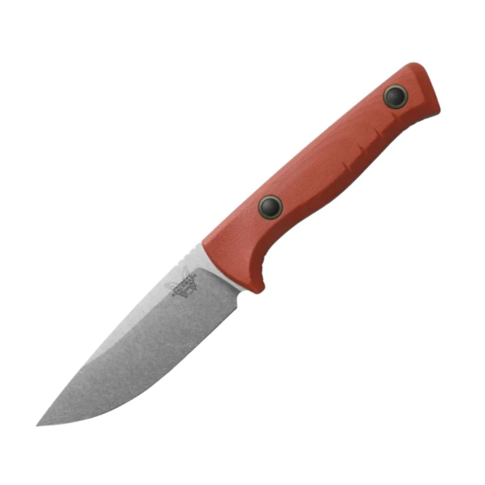 The Benchmade SlipRidge™ Fixed Blade (15650-01) shown with its 3.7-inch CPM MagnaCut stainless drop-point blade in a satin finish, Rust Orange G10 handle with a deep finger choil, and its modular OD Green Boltaron® sheath. The high tip and full belly of the drop-point profile are visible alongside the contoured pinch points on the spine, built for both precision detail work and heavier big-game processing.