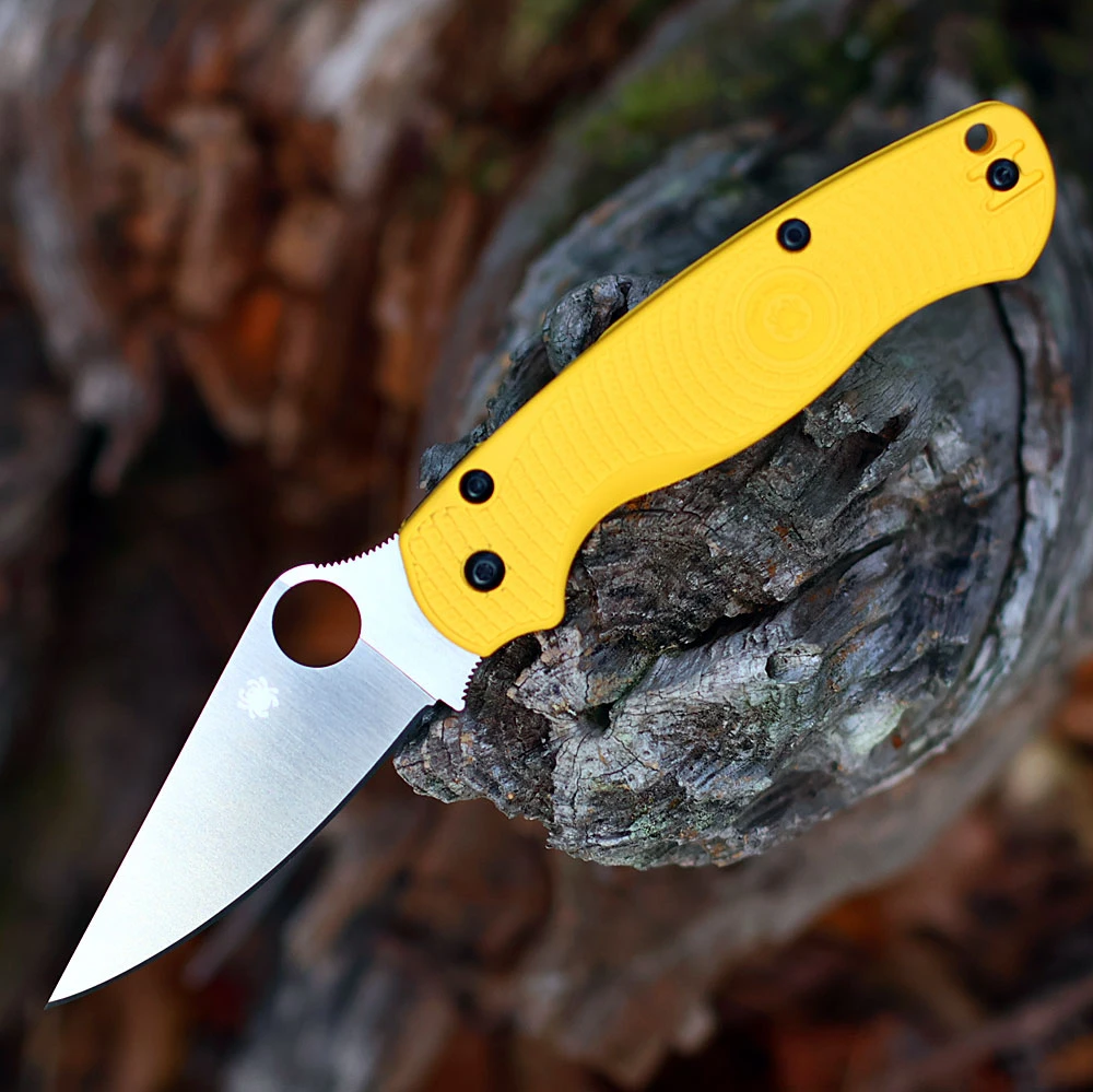 A Spyderco Para Military 2 Lightweight Salt C81PYL2 shown fully open. The 3.47-inch CPM® MagnaCut® full-flat blade is deployed in satin finish; the yellow FRN handle shows Bi-Directional Texture™ with the Compression Lock® visible on the spine and reversible wire clip mounted tip-up.